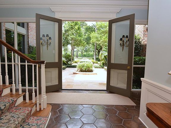 ~ Terraced Manicured Courtyard and Golf Course is Viewed from Entry ~