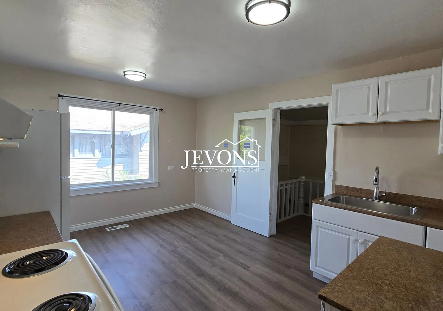 $250 Off First Month's Rent. Charming 2 Bed, 1 Bath Home with Fenced Yard and Garage. — Photo 3