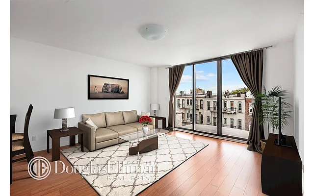 Sold by Douglas Elliman | media 13