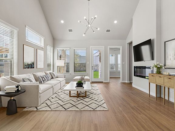 Living Room in the Picasso II home plan by Trophy Signature Homes - REPRESENTATIVE PHOTO