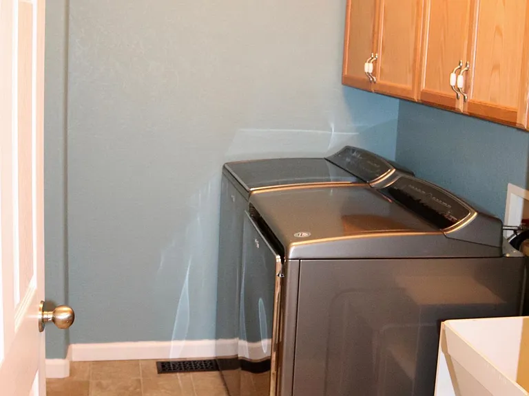 Laundry room with washer and dryer