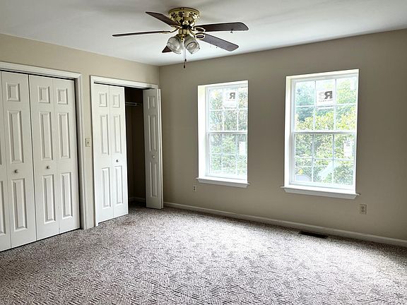 Primary bedroom. 2 sets of 4 total closets in this room.