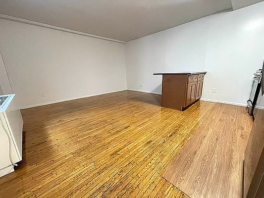 3rd image of 121 E 12th St APT 2F