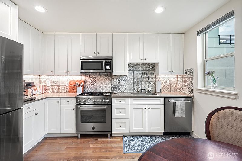 4th image of 5021 Sand Point Place NE #E