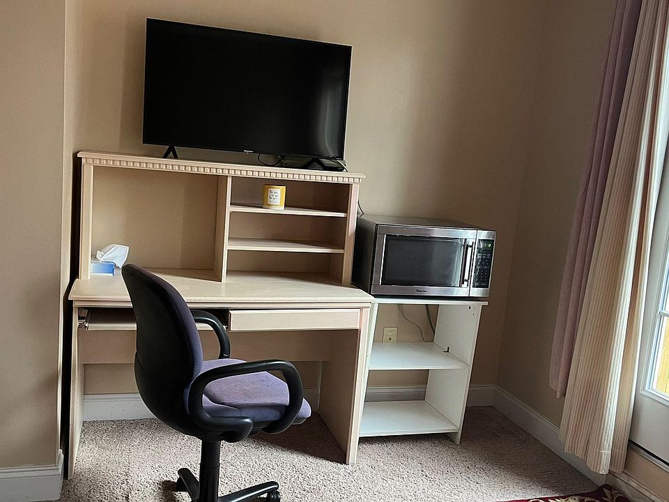 Designated office place along with a TV for entertainment