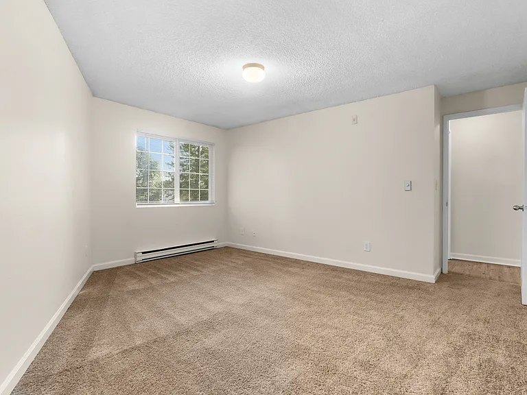 Experience comfort in this bright and airy bedroom, ready for your personal touch. Experience comfort in this bright and airy bedroom, ready for your personal touch.