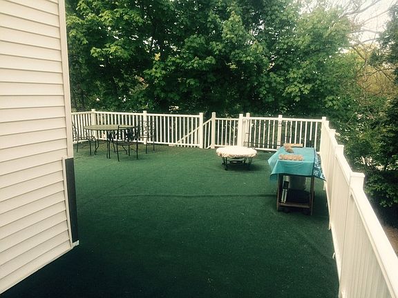 Right Side Rear : Large Carpeted Wrap Around Deck