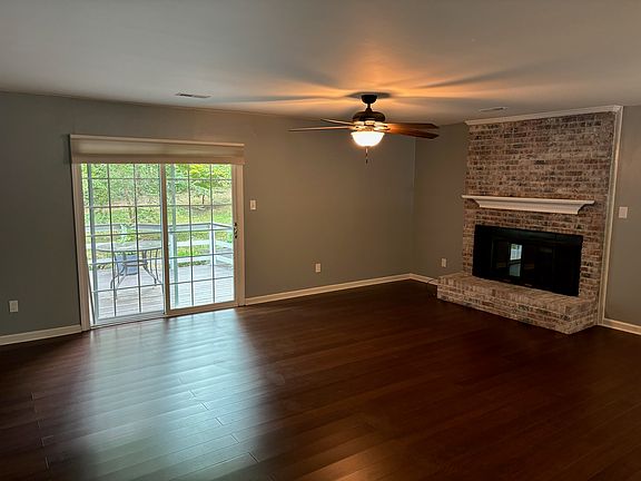 Living room & sliding glass door to deck/back yard