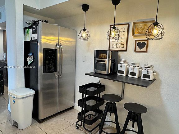 3rd image of 3600 Mystic Pointe Dr APT 910