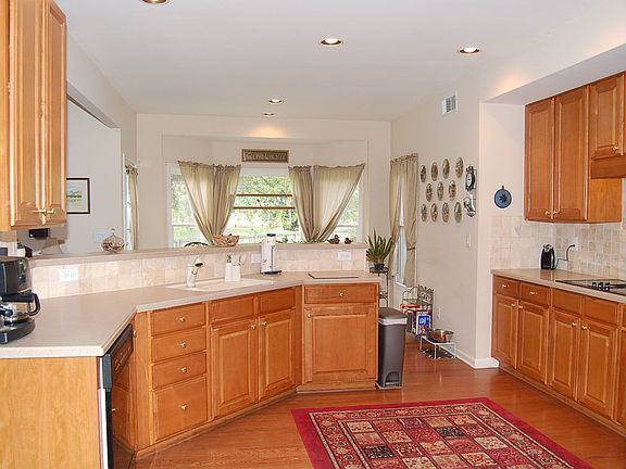 The Gourmet Chef Will Love the Open Kitchen Loaded with Cabinets & Counters  