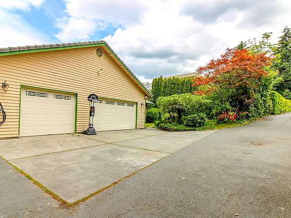3 Car Garage, abundance of parking space.