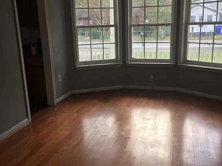 Dining room with bay window.