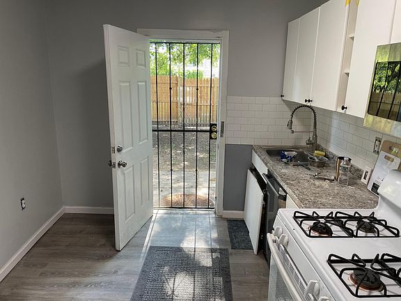 Kitchen with dishwasher and microwave