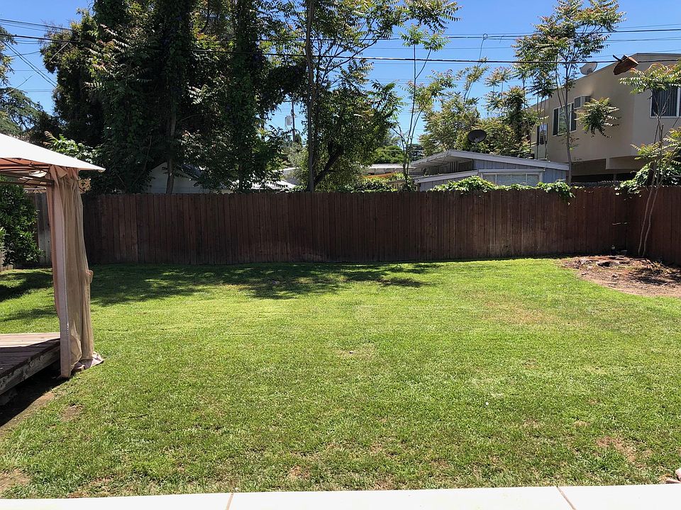 backyard fenced and walled all around