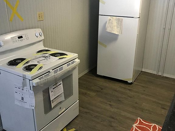 Kitchen is light, airy and inviting, and has plenty of space!