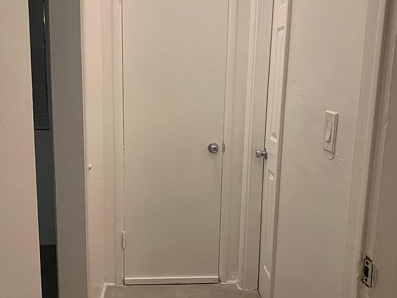 Hallway way to closet and bathroom