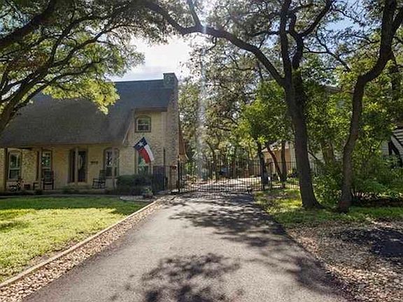 Driveway view so you can see the distance between the garage apartments not included.