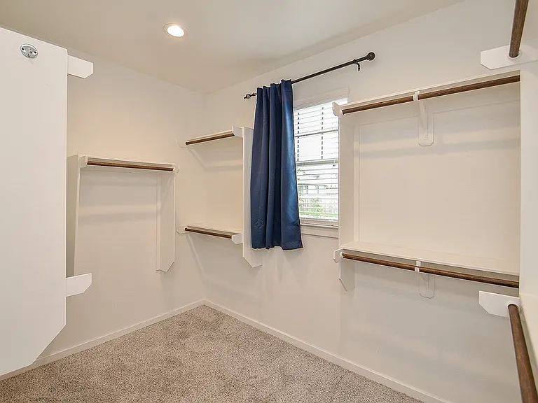 Primary/Master closet. Very spacious, plenty of natural light.
