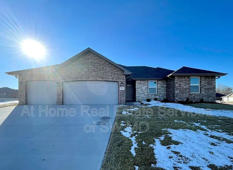 5943 S Iris Ln — Photo 2