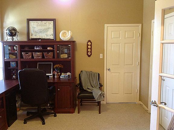 To the left, it's a study - perfect home office!  This room also has a closet so it could be a 4th bedroom!