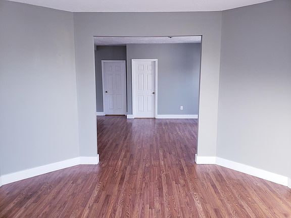 View from main parlor. Bedroom #2 door on right. Bathroom door on left