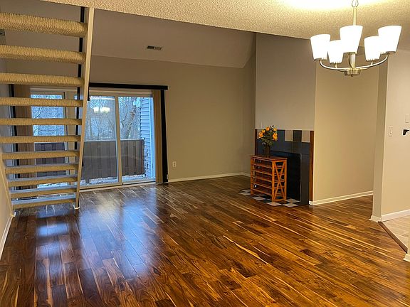 Huge living area with stairs to loft