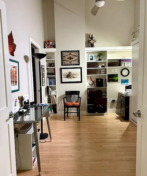 2nd bedroom makes a perfect office/den with a Murphy bed for guests. Built in shelving.