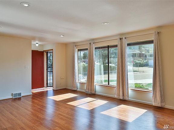 Check out how bright this living room is! Facing direction of the house creates ample of sunlight.  