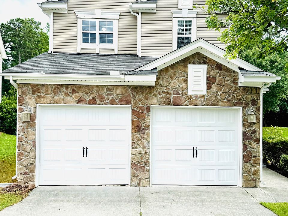 Two Car Garage with additional parking in driveway