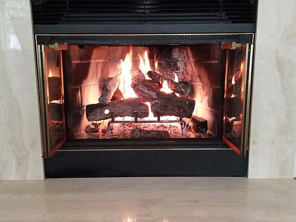 Beautiful gas fireplace so cozy, so chill, in any season. It will warm you!