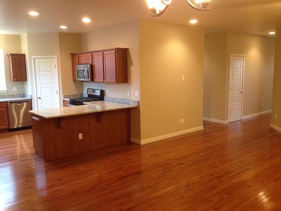 View from Dining Area toward Kitchen and Living Space
