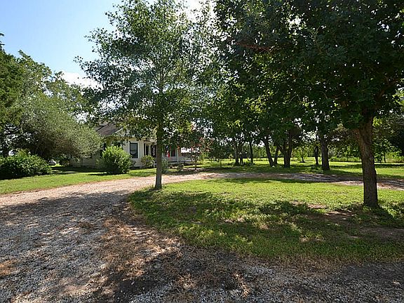 Circular drive in front of home.