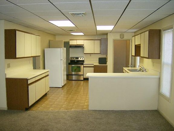View of kitchen from west side of living room