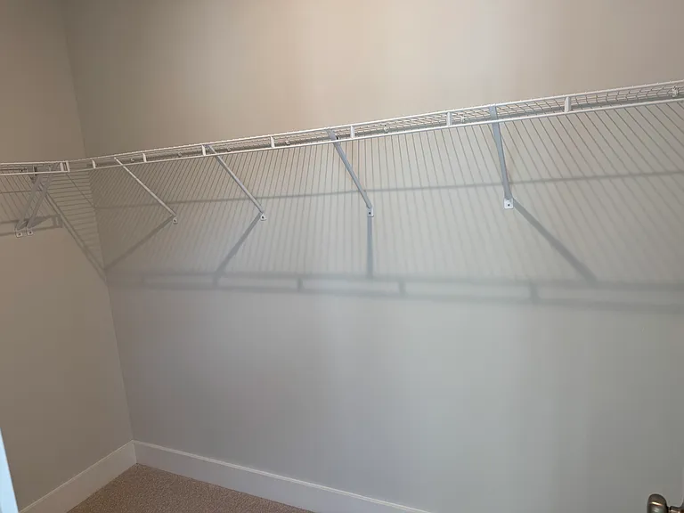 Primary Bedroom Walk-In Closet