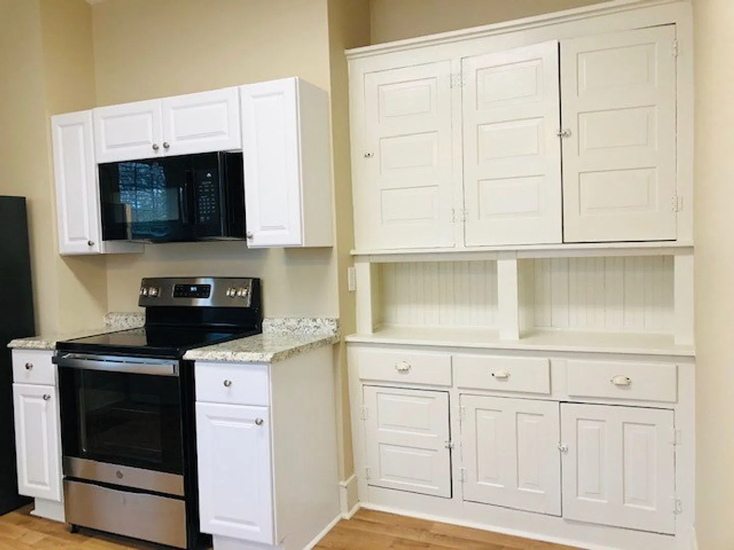 This cute Bungalow Home has nice size rooms, with hardwood floors, Heat/Air, 2 BD, 1 full BA, loc... — Photo 4