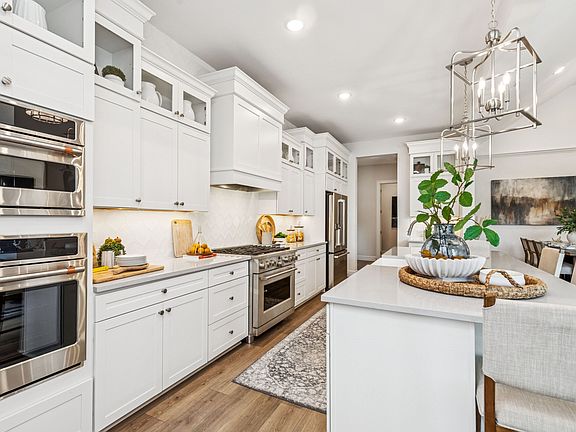 Kitchen with upper glass cabinets