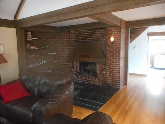 Living room wood burning fireplace