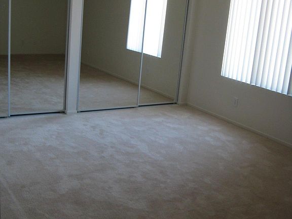 Bedroom before new flooring