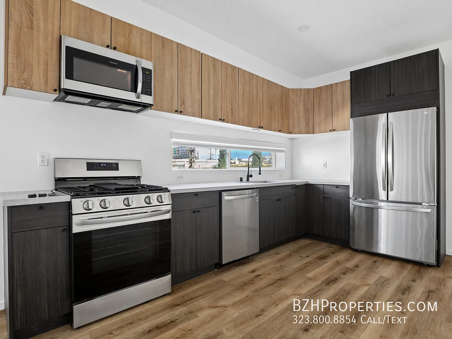 Contemporary 3 Bedroom Home with In-Unit Laundry & 2-Car Garage — Photo 3