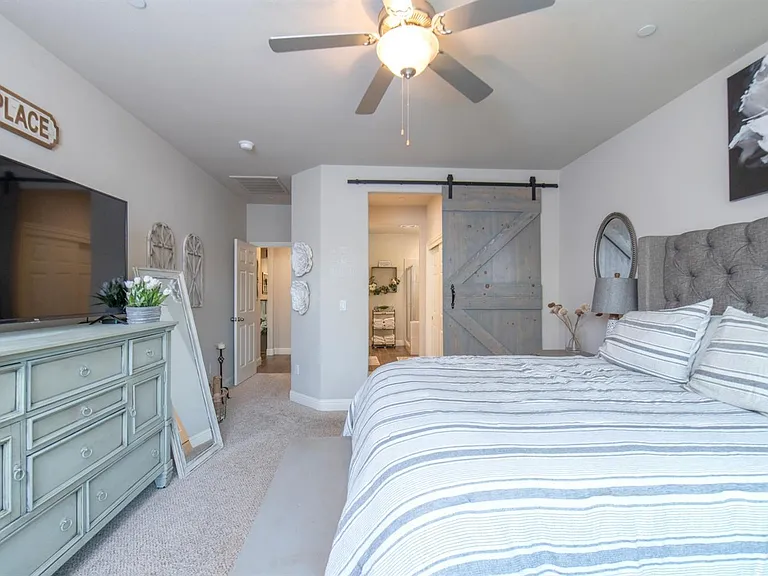 Master Bedroom with Barn door to Bathroom