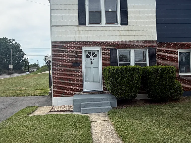 Street front view of house. Front porch just repaired and painted.