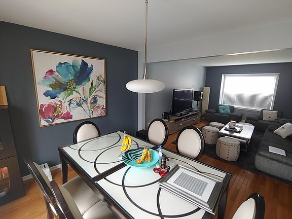 different view of open concept of dining room and living room