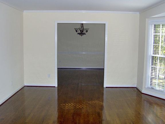 View of dining room from foyer through living room.