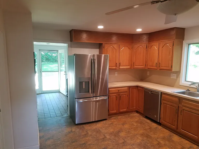 Kitchen with stainless steel appliances.