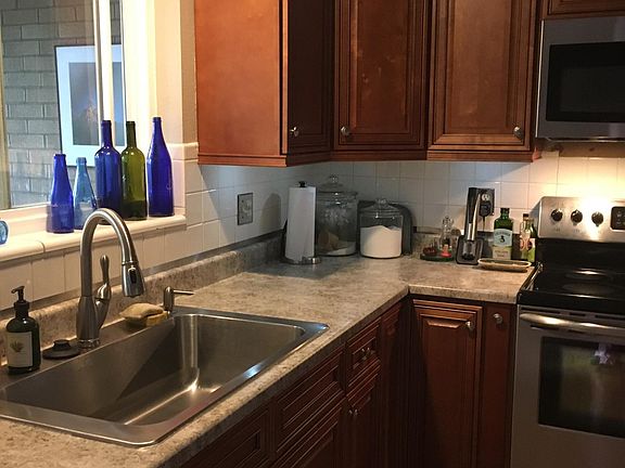 New kitchen cabinets with stainless steel appliances