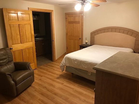 Bedroom. Bathroom is in the open door