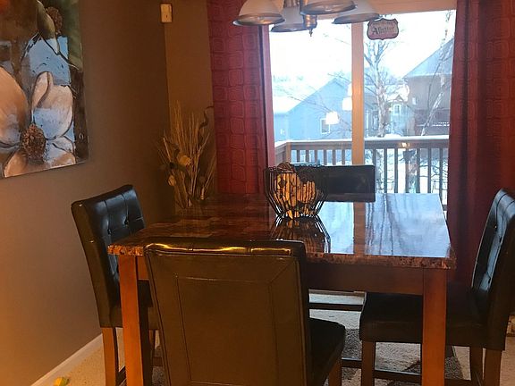 Dining area with sliding doors to deck.
