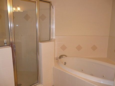 Large shower with seperate jetted tub.
