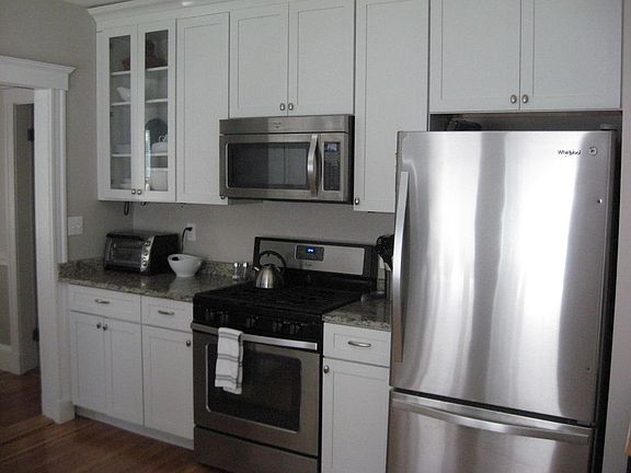 Granite kitchen with solid wood cabinets and soft close drawers and doors.