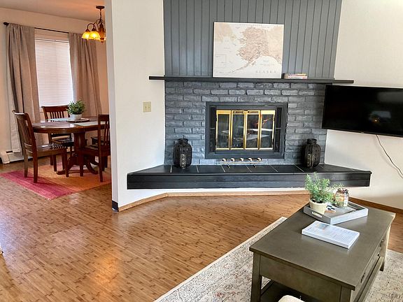 Living room and view of dining room.